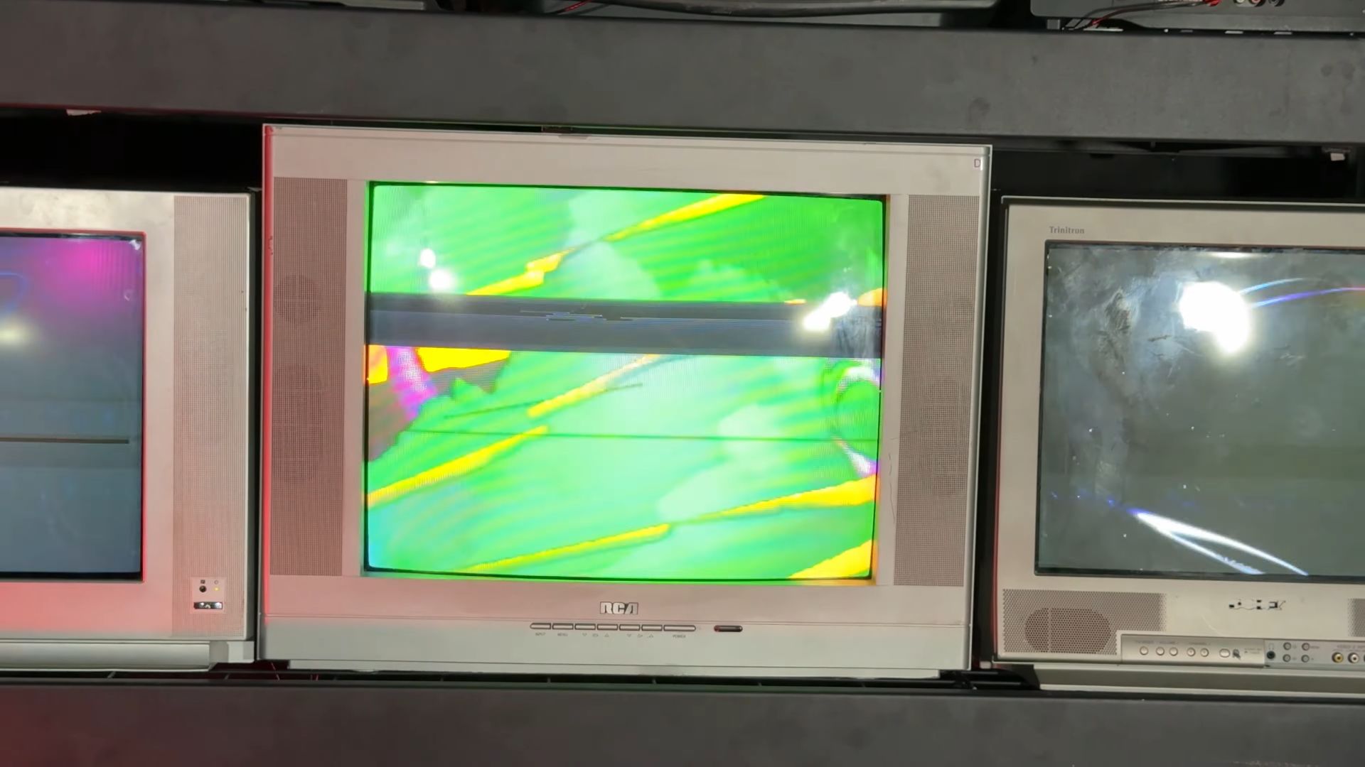 The horizontal line on the RCA CRT TV screen is caused by switching the input signal routed to that TV.